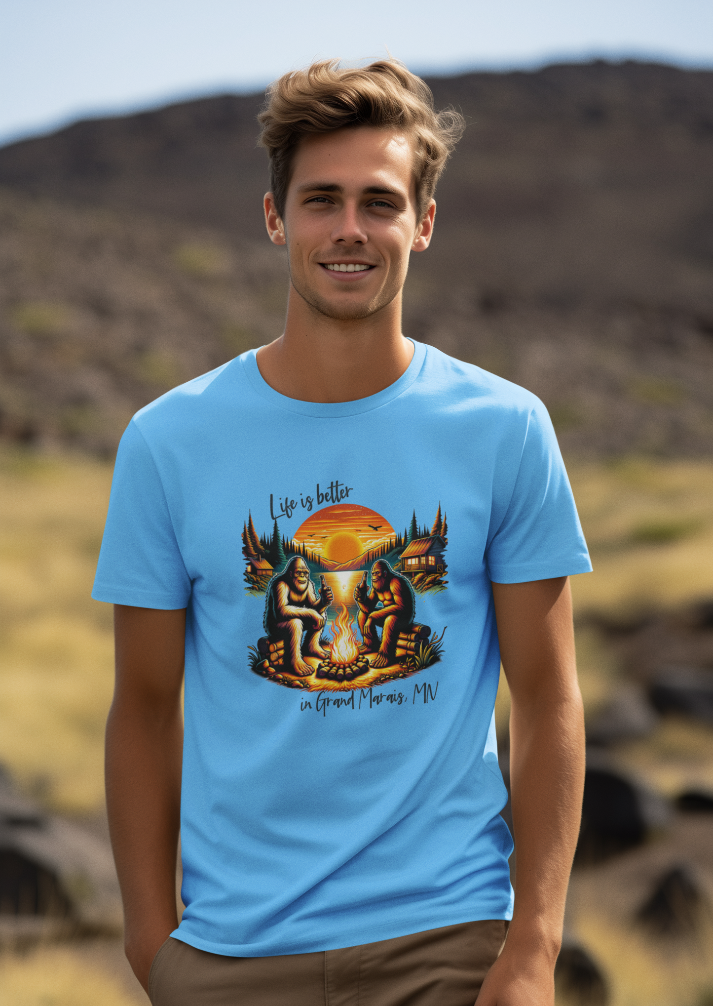 Life is better in...YOUR LOCATION - Bigfoot campfire shirt: Carolina blue / 3X