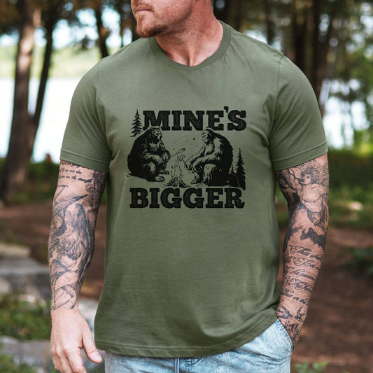 Mine’s Bigger Campfire Graphic Tee 291: Gildan Softstyle / Military / L